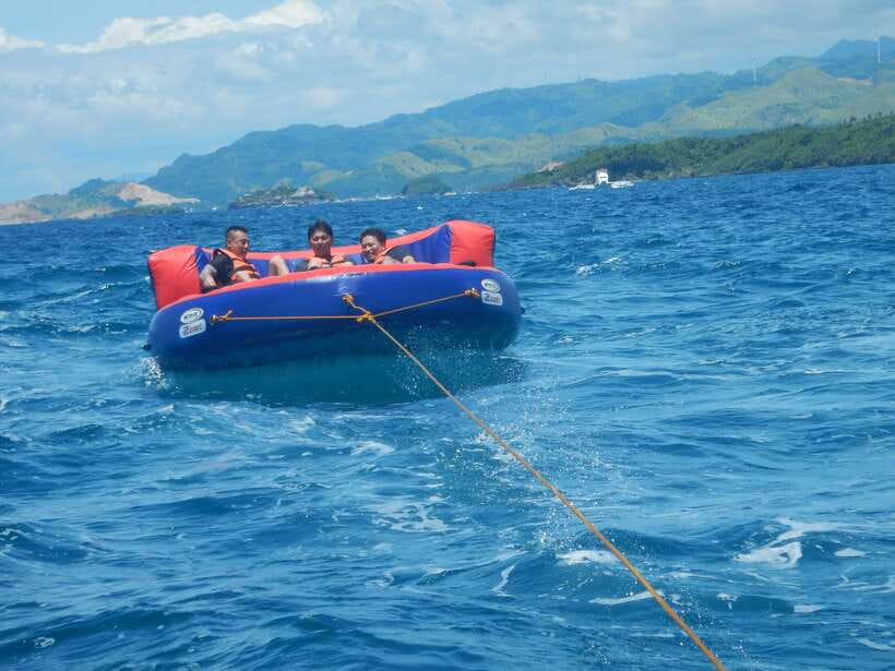 Boracay: Flying Donut Water Tubing Experience - Photo Moments, Shoreline Time, and Getting Back by Speedboat