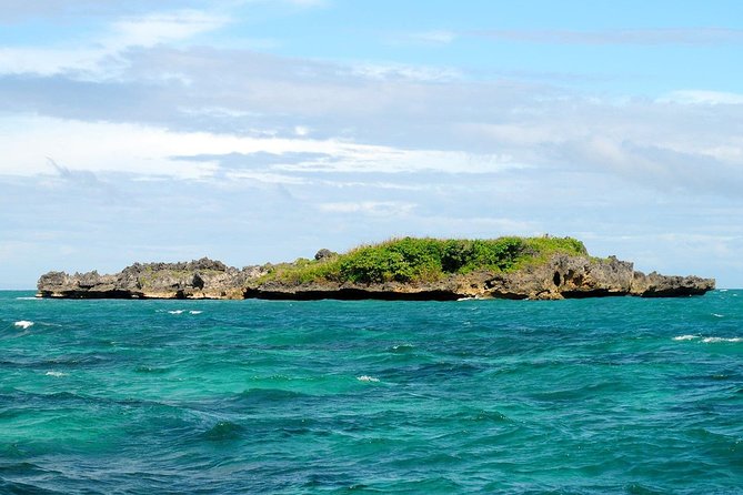 Boracay Island Hopping + Hot Kawa + Parasailing + Helmet Diving - The payoff: islands, air time, and a hot bath in one half-day