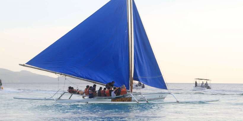 Boracay: Private Traditional Bamboo Boat Sailing Tour - Photos, wind, and that classic paraw moment on the beach