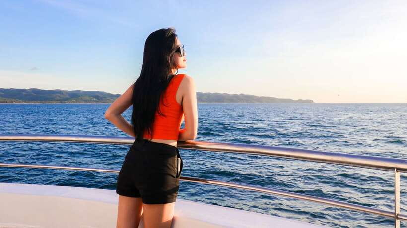 Boracay: Scenic Sunset Cruise with Live Music - Arriving by e-trike at White Beach, in front of Astoria Boracay