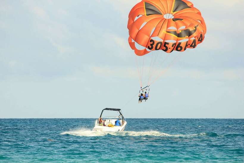 Boracay: Solo or Tandem Parasailing Experience - Station 1 vs Station 3: where you meet and how you get to the water sports station