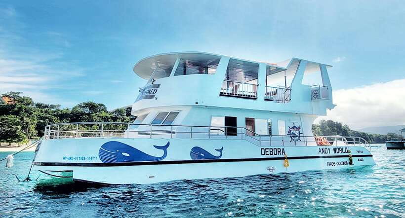 Boracay: Ultimate Party Cruise aboard the Andy World Yacht - Water time: crystal kayak, paddle board, mermaid tail, dive board, and snorkeling