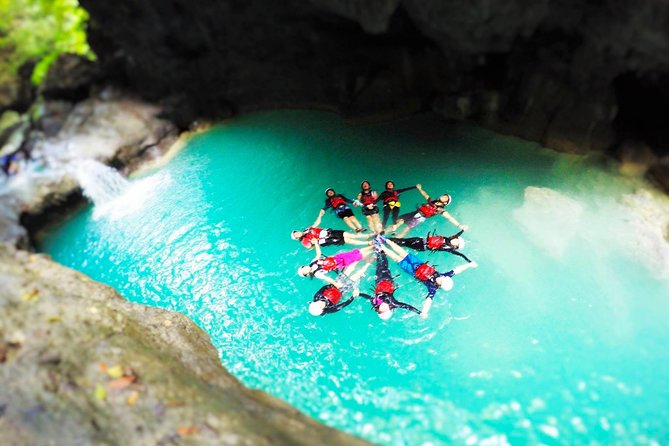 Canyoneering in Kawasan Badian Tour with Lunch & Transportation - Stop 2: Kawasan Falls, quick and sometimes affected