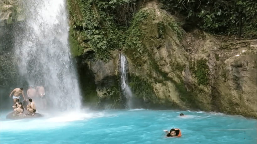 Cebu: Inambakan, Kawasan, and Mantayupan Waterfalls Tour - Stop 2, Kawasan Falls near Badian: turquoise pools and bamboo rafts