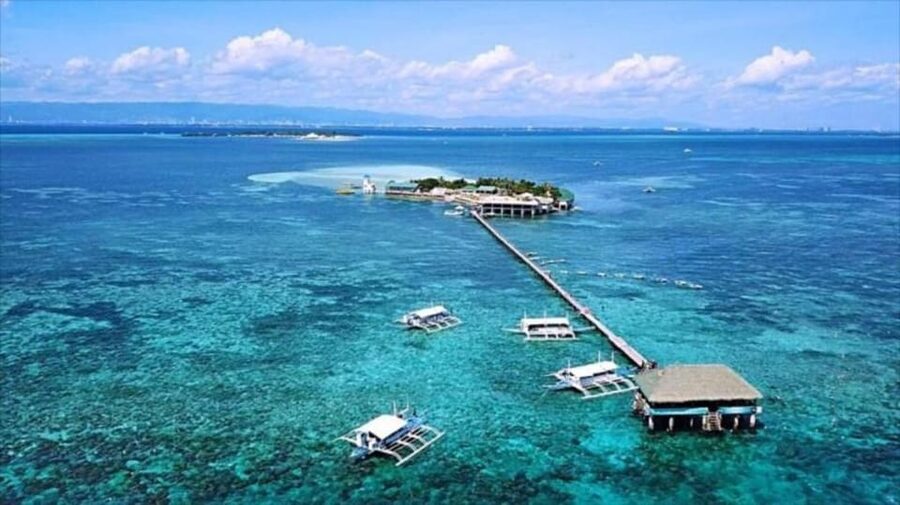Cebu: Mactan Island Hopping Boat Tour with Lunch - Caohagan Island: guided beach time, swimming, and easier breaks