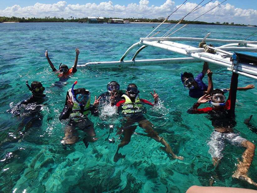 Cebu: Mactan Island Hopping Boat Tour with Lunch - Nalusuan Island: sandbar strolling, snorkeling, and your lunch break