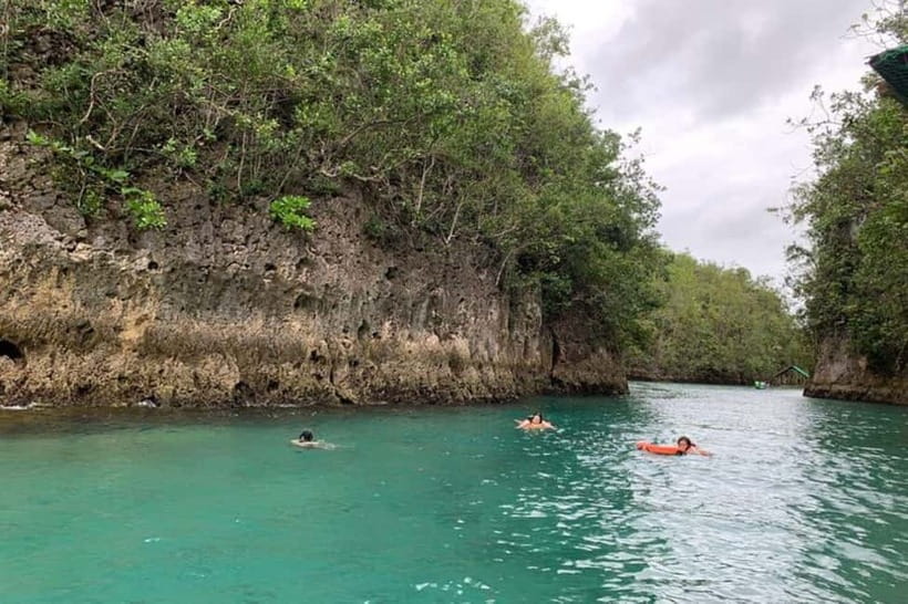 Cebu: Mantayupan Falls, Hermit's Cove & Bojo River Eco Tour - Mantayupan Falls: walking in, then cooling off at 98 meters