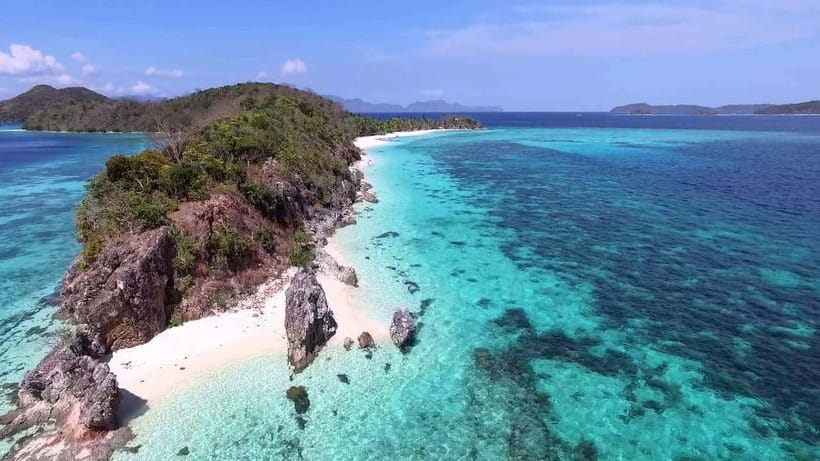 Coron: Coastal Cliffs, Beach & Malcapuya Island Hopping Tour - Malcapuya Island, Where Snorkeling and Beach Quality Meet