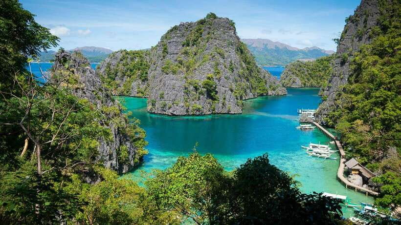 Coron: Complete Island Hopping Guided Tour with Lunch - Kayangan Lake: the clear-water start
