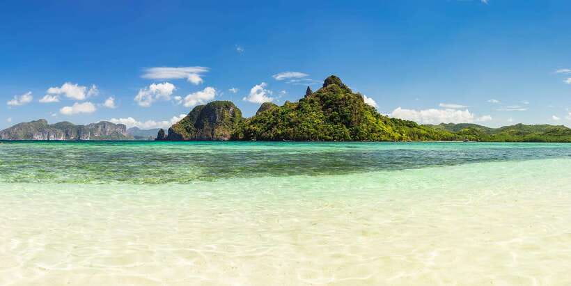 Coron Island Escapade: A Tropical Feast & Adventure - The boat day setup: life vests, snacks, and a guide who keeps it moving