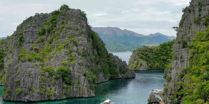 Coron Island Escapade: A Tropical Feast & Adventure - Malcapuya Island: powdery sand, snorkeling time, and calm water