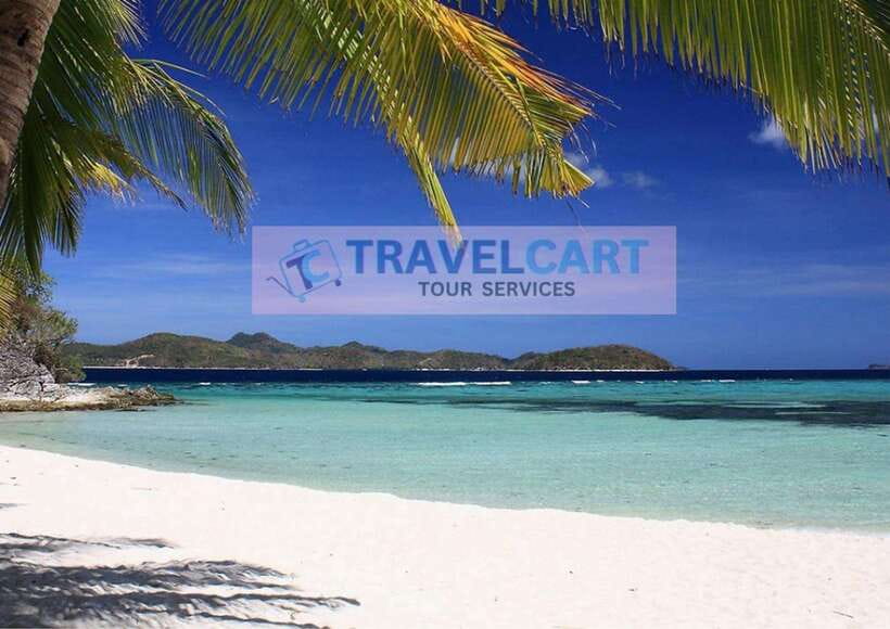Coron Island Escapade Boat Tour with Lunch - Stop 1: Malcapuya Island for powdery sand, swimming, and lunch