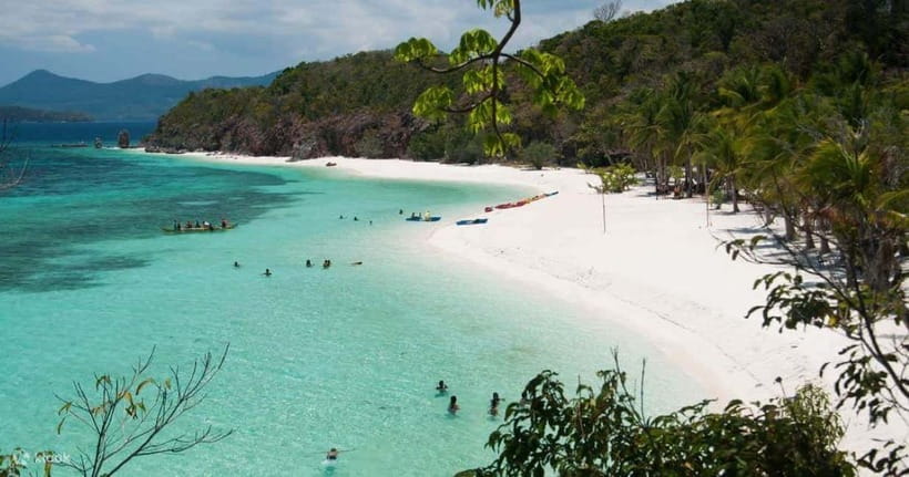 Coron: Island Escapade Tour with Lunch - Malcapuya Island: white sand time plus reef snorkeling on the clock