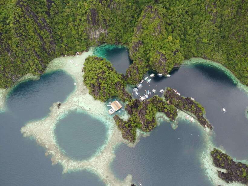 Coron: Kayangan Lake, Twin Lagoon, and Siete Pecados Tour - Kayangan Lake viewpoint and the clear-water swim that sets the tone