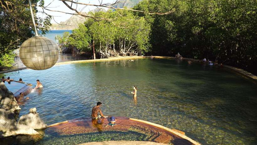 Coron Town Tour: Maquinit Hot Spring - Coron Town stops: plaza, park time, and St Augustine Church