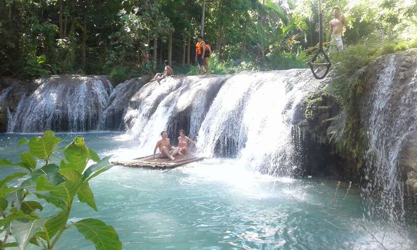 Dumaguete: Siquijor Island & Cambugahay Falls Private Tour - St. Francis of Assisi Church and Paliton Beach: history plus a fast scenic start