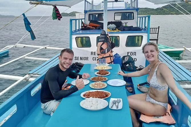 El Nido Group Tour A with Beach Lunch - Seven Commandos Beach: beach time, swimming, and a coconut