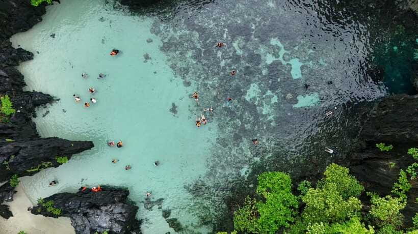 El Nido:Private Tour D with Highlights Small & Cadlao Lagoon - Serenity Beach, Pasandigan Beach, and the Calm Sands You Came For