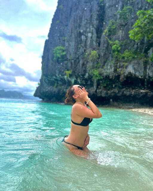 El Nido: Snake Island and Cave Tour with Island Lunch - Cathedral Cave accessed by boat: arches that look like architecture
