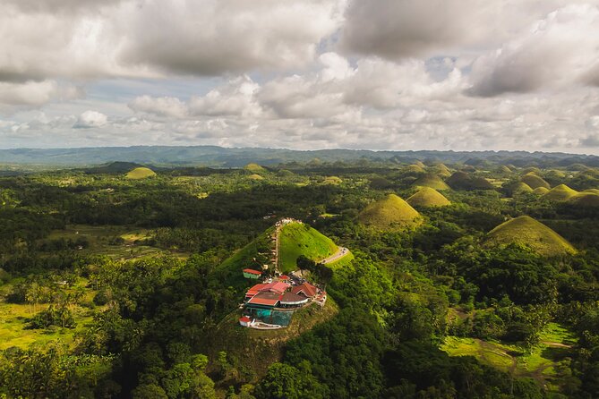 Famous Bohol Chocolate Hills Loboc River Cruise Tarsier Tour - Tagbilaran pickup and the comfort that actually matters