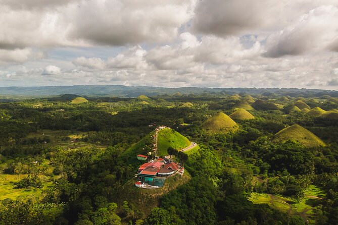 Famous Bohol Chocolate Hills Loboc River Cruise Tarsier Tour - Sipatan Twin Hanging Bridge, where the photos come easy