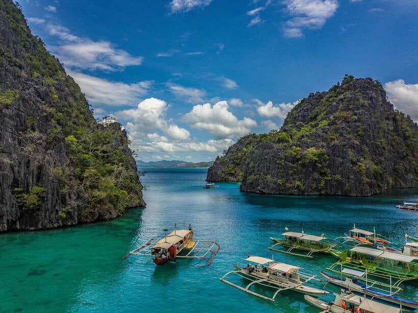 From Coron: Island Hopping Boat Day Trip with Buffet Lunch - Beach stops along the way: CYC beach, Sunset Beach, and Atwayan Beach