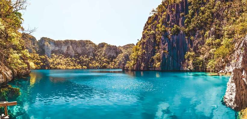 From Coron: Island Hopping Boat Day Trip with Buffet Lunch - Malcapuya Island and the cruise views