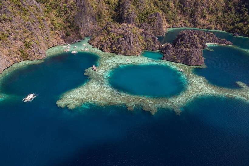 From Coron: Island Hopping Boat Day Trip with Buffet Lunch - Pickup and getting to the boat in Coron Town Proper