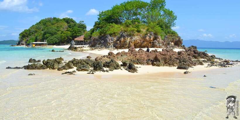 From Coron: Private Island-Hopping Cruise with Lunch - Stop 2: Bulog Dos, corals plus the long snaking sandbar