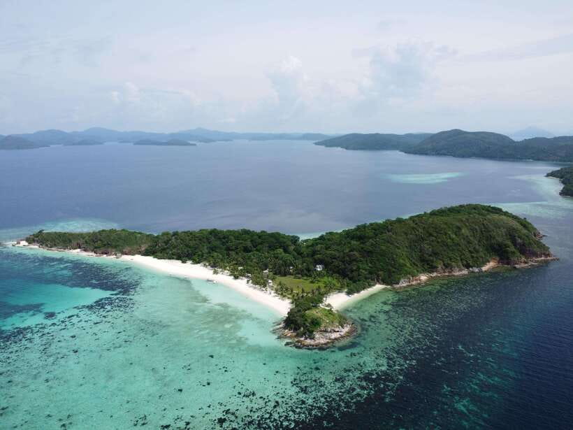 From Coron Town: Beaches and Islands Boat Tour with Lunch - Bulog Island: a one-hour pause with guided moments and water time