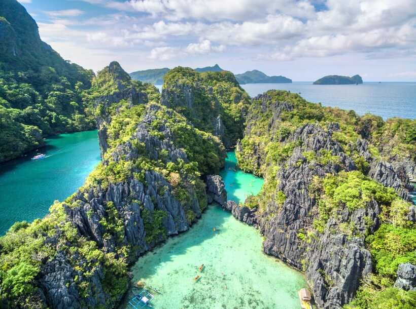 From El Nido: Island, Lagoons, and Beaches Boat Tour - Pasandigan Cove: another swimming stop and a marine-life bonus