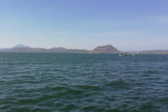 From Manila: Amazing Taal Volcano Island Boat Lake Tour w/ Guide - People’s Park in the Sky ruins: jeepney ride and unfinished history