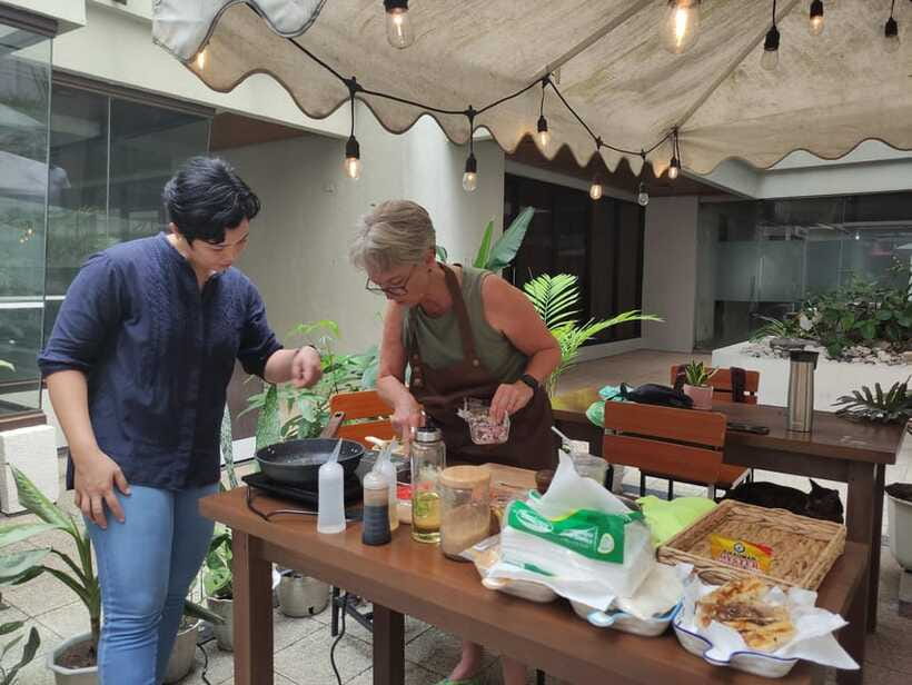 Makati: Hands on Manila Cooking Class - Outdoor courtyard reality check, rain and comfort