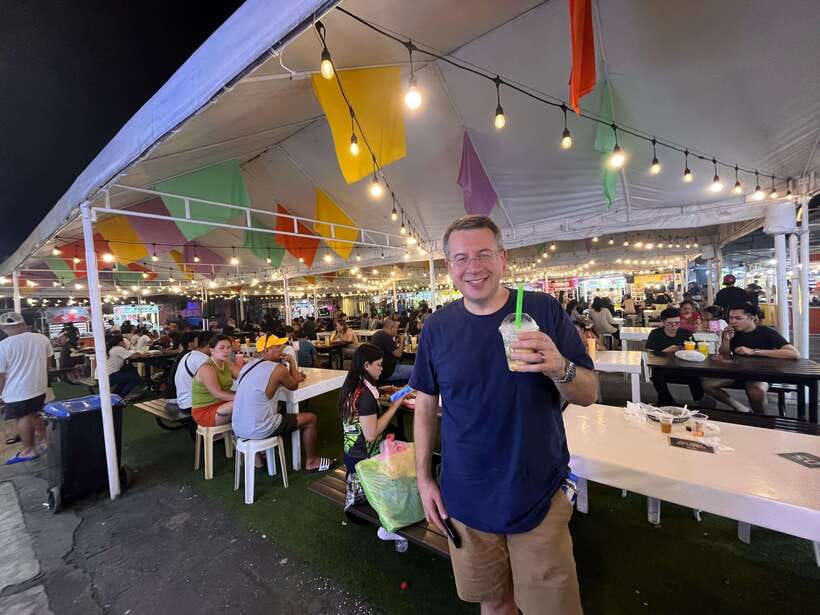 Manila Night Market with Local Guide - The photo souvenir and the rooftop bar finish