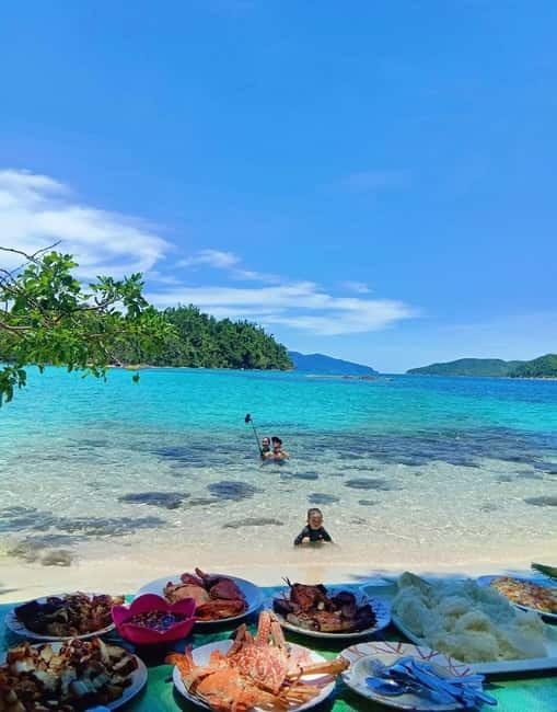 Port Barton: Island Hopping with Lunch,Hotel Transfer & Fees - Twin Peaks Reef: your first reef swim and what to look for