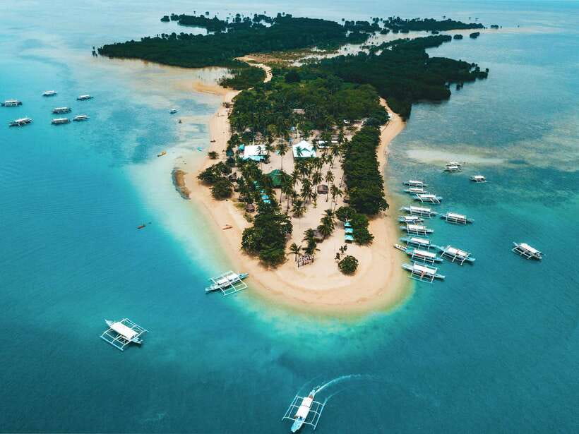 Puerto Princesa: Private Honda Bay Island Hopping Tour - Cowrie Island: buffet lunch, the long beach block, and a better ending