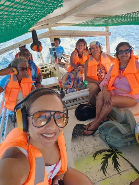 Siargao: Jellyfish Sohoton Cove Tour with Lunch and Pickup - Magkukuob Cave: helmets, low ceilings, and the cliff-jump moment